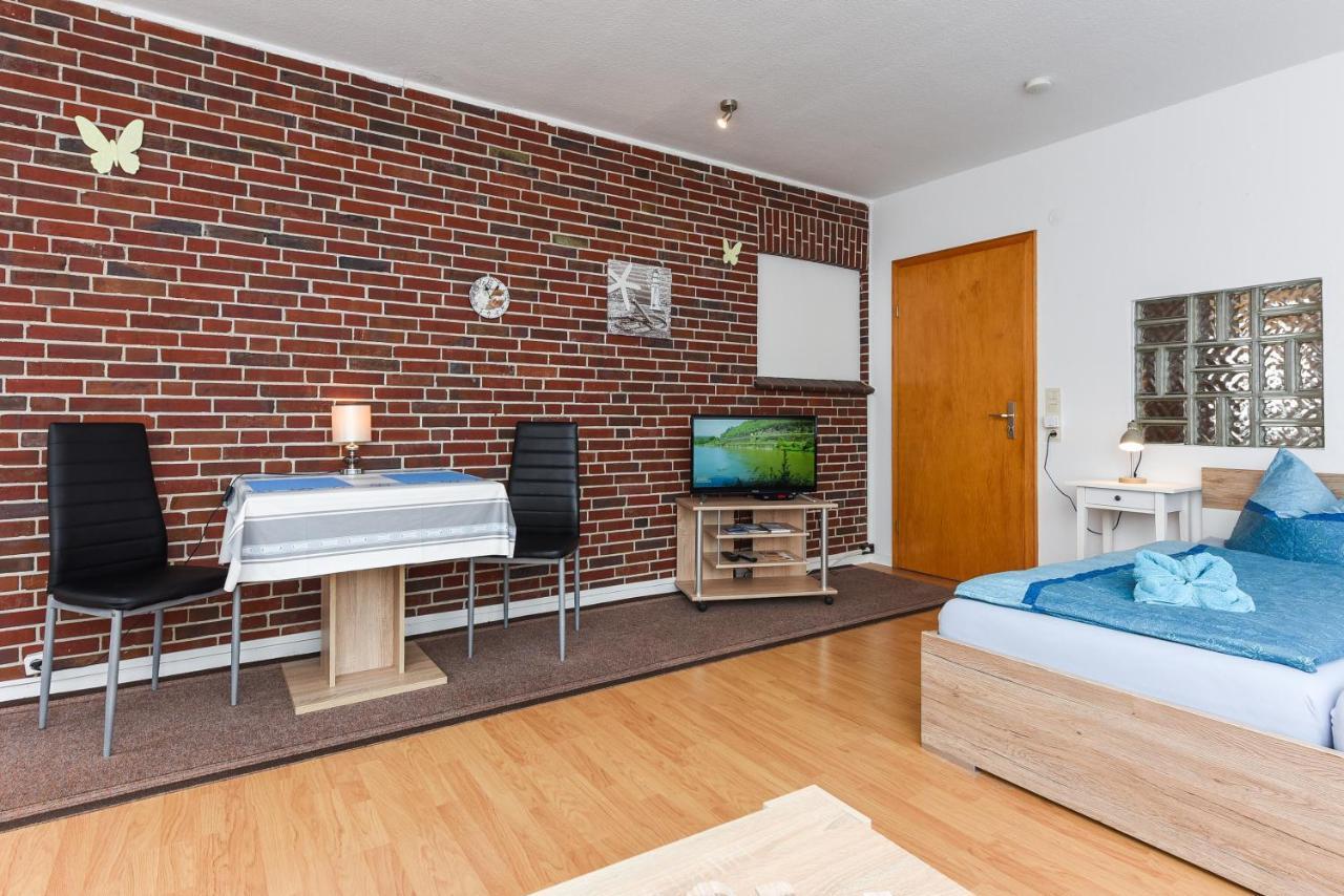 Ferienwohnungen Im Haus Waterkant Neuharlingersiel Exteriör bild