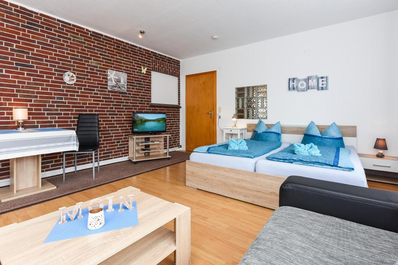 Ferienwohnungen Im Haus Waterkant Neuharlingersiel Exteriör bild