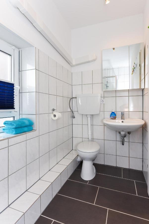 Ferienwohnungen Im Haus Waterkant Neuharlingersiel Exteriör bild